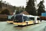 Berner Oberland STI Thun Nr. 122/BE 700'122 MAN am 10. Februar 2009 Thun, Schiffl�ndte (auf diesem Foto sind beide MAN mit der versuchsweise montierten Klimaanlage auf dem Dach zu sehen; der Gelenkbus Nr. 122 und daneben der Zweiachsbus Nr. 124!)