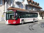 Fribourg tpf - Mercedes Citaro Nr.79  Fr.300340 unterwegs auf der Linie 479 bei der Haltestelle vor dem Bahnhof in Romont am 28.02.2009