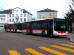 stgallen Beide Typen MAN Lions City 2-Achser Nr. 262 (2-t�rig) und Nr. 254 (3-t�rig) beim Bahnhof St. Gallen am 11.03.09.