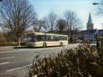 hamm-stadtwerke-hamm-gmbh---verkehrsbetrieb Hako 38 mit einem von Hamms Wahrzeichen, der Pauluskirche im Hintergrund an der Nordstra�e beim Fahrgastwechsel.