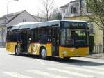 Postauto Postauto - MAN AG 17943 bei der Haltestelle vor dem Bahnhof in Koblenz am 09.04.2009