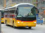 Postauto Postauto - MAN  VS 243892 unterwegs vor dem Bahnhof in Brig am 08.04.2009