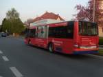 man-niederflurbus-3-generation-lions-city WSF-VV18, ein MAN Lion&acute;s City � CNG,f�hrt am Abend des 24.04.2009 gerade einen Kurs der Linie 5 und biegt hier von der Beuditzstra�e in den Kirschweg. Gesehen zwischen den Haltestellen Wei�enfels Mozartstra�e und Wei�enfels Kirschweg in Wei�enfels West.