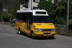 Tessin AutoPostale Ticino, PU Barenco&Andreoli SA, Faido, TI 109'318 (Iveco Daily 50C17, 2007) am 22.4.2009 beim Bahnhof Lavorgo. 