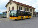 Postauto Postauto - Mercedes Citaro  BE 652123 vor dem Bahnhof Kerzers am 17.04.2009