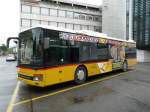 Postauto Postauto - Setra S 315 NF  JU 31091 mit Teilwerbung bei den Postautohaltestellen gegen�ber dem Bahnhof von Delemont am 11.05.2009