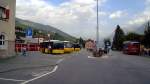 Postauto PostAuto- und andere Busse (sowie die RhB) warten im Bahnhof Scuol auf Kundschaft, 11. Sept. 2008