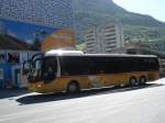 Postauto MAN Lions Regio R13 bei der Abfahrt beim Bahnhof in Visp