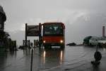sudtiroler-autobus-dienst-sad Bei Starkregen und Gewitter erreicht der O404 Nr. 891 (BH111JX) der SAD am 24.7.2007 als Morgenkurs die Passh�he des Stilfserjochs. 