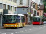 Postauto Postauto + VB Biel - Setra BE 350471 unterwegs auf der Linie 86 zusammen mit dem NAW Trolleybus Nr.87 der unterwegs auf der Linie 4 ist in der Aarbergstrasse am 07.06.2009