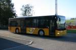 Postauto PU Geinoz, Estavayer-le-Gibloux, FR 300'459 (MAN Lion's City M / A35, 2007) am 31.8.2009 in Cottens. 