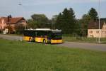 Postauto PU Motrag, Flaach, Nr. 212 (ZH 332'706, MAN Lion's City A20, 2006) am 7.9.2009 auf der Linie 665 bei Neftenbach, T�ssalmend. 