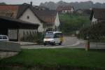 Postauto PU Stucki, Porrentruy, BE 26'694 (MB Sprinter 416CDI) am 21.9.2009 in Buix JU.
