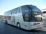 Neoplan Starliner Rexer-Reisen mit einem Starliner 1 auf dem Messeparkplatz in Stuttgart, am 19.01.2010.