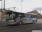 setra-s-300er-serie Setra S 315 UL �berlandbus der Fa. Bader Reisen im Busbahnhof Wendlingen am Neckar mit Werbung f�r SRT-Bader Natursteine nach Ma�. (23.02.2010)