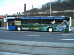 saarbrucken Ein MAN-Lions City der Firma Bur-Reisen die im Auftrag f�r Saarbahn und Bus f�hrt am R�merkastel in Saarbr�cken. Die Aufnahme des Fotos war am 05.03.2010. Auf dem Bus ist Werbung eines Saarbr�cker-Energie Unternehmens zu sehen. Dieses Foto zeigt Werbung mit einem Panorama aus Saarbr�cken.