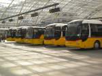 Kt. Graubunden Der Busbahnhof von Chur mit 4 MAN LION`S REGIO und einem Neoplan Postautos. 25.02.2010 