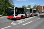 hamburg Der MB O530G der HHA mit der Nummer 7210 zum Zeitpunkt der Aufnahme gerade als Tauschbus von Hummelsb�ttel aus eingesetzt am 5.Mai 2010 auf der Metrobuslinie 7 in Barmbek