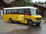 Postauto Mercedes-Benz Vario 815 D BE 305545 von PU K�bli. Aufgenommen am 19.06.2010 beim Bahnhof in Gstaad.
