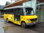 Postauto Mercedes-Benz Vario 815 D BE 21779 von PU K�bli in Gstaad. Aufgenommen am 19.06.2010 beim Bahnhof in Gstaad