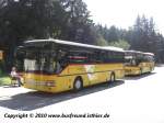 Postauto PostAuto, ein Setra 315UL und ein Mercedes-Benz O550 Integro, in Andermatt