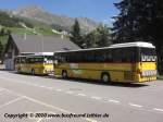 Postauto PostAuto, ein Setra 315UL und ein Mercedes-Benz O550 Integro, in Andermatt