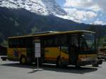 Hier ein Setra 412UL von GrindelwaldBus am Bahnhof in Grindelwald ...