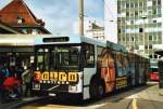 Transports Publics fribourgeois TPF Fribourg Nr. 509/FR 300'414 Volvo/Hess Gelenkduobus (ex TF Fribourg Nr. 109) am 19. Mai 2010 Fribourg, Bahnhof (mit Vollwerbung f�r 'Metro Boutique')