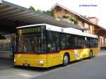 Postauto MAN- Postauto wartet in Langnau a. A. den Anschluss der SZU ab, und setzt die Reise danach weiter.