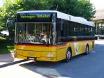 Postauto MAN / BE 614040 - Post Regiobus bei der Haltestelle vor dem Bahnhof in Meiringen am 04.08.2007