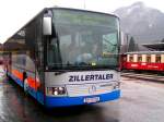 zillertalbahn Mercedes-INTEGRO  aus der Busflotte, im Hintergrund ein Nostalgiezug dieses privaten Verkehrsunternehmens; Jenbach 080312