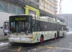 NAW Trolleybus VB Biel - NAW Trolleybus Nr.90 mit Vollwerbung bei der Haltestelle beim Bahnhof wieder unter Strom um 08.18 Uhr am 21.03.2008