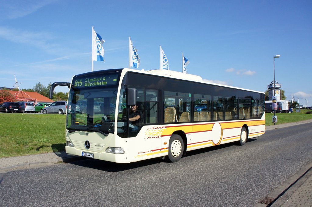 Bus Simmern / Hunsrück: Mercedes-Benz Citaro Ü der Stemmler-Bus GmbH aus Kastellaun (Lackierung: Demy Schandeler Sàrl - Demy Cars aus Luxemburg), aufgenommen im September 2017 im Stadtgebiet von Simmern / Hunsrück.
