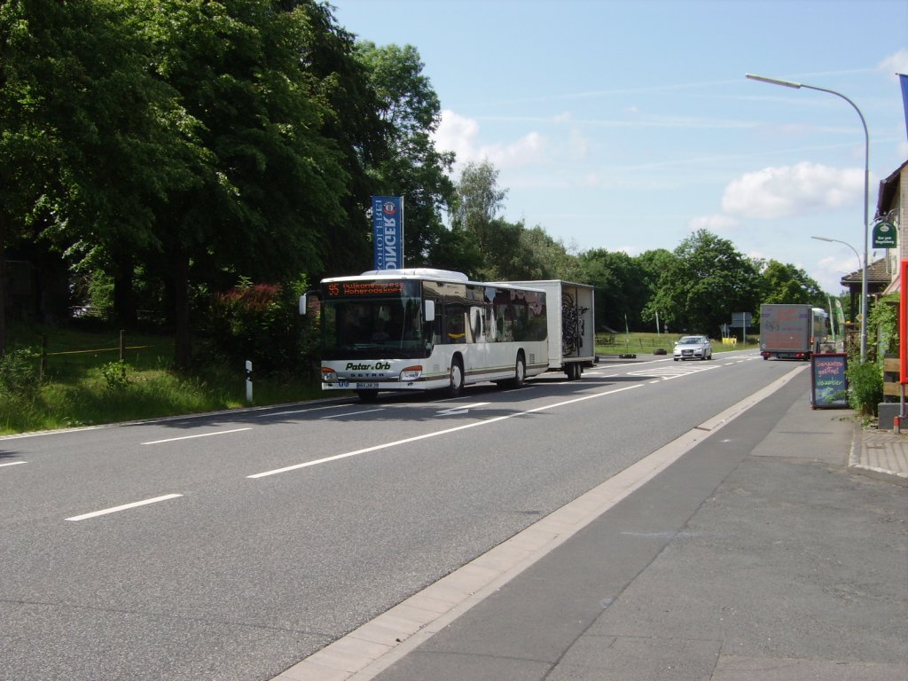 Ein Setra berland Bus von Peter von Orb mit Fahrrad Anhnger als Vulkan Express zum Hohenrodskopf in Herchenhain (Vogelsberg) am 12.06.11