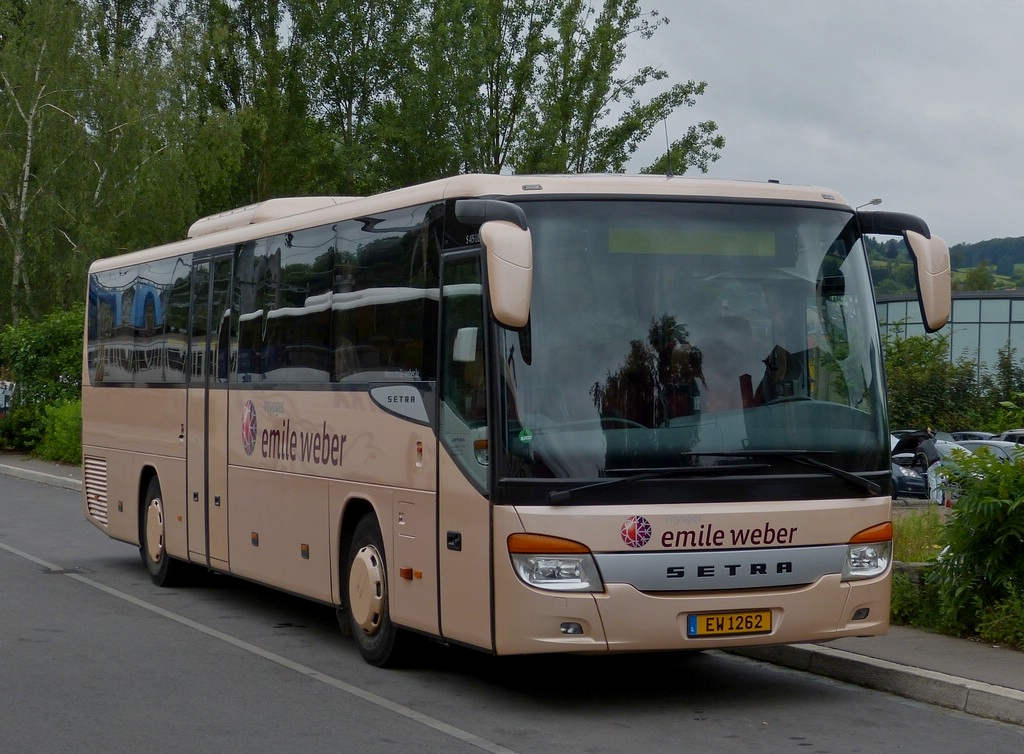 (EW 1262) Setra S 415 UL von Emile Weber, steht am 05.07.2013 am Bahnhof in Ettelbrck.