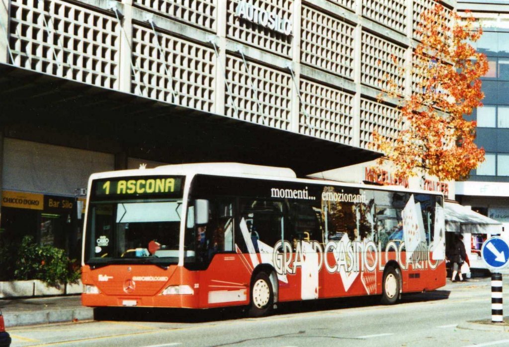 FART Locarno Nr. 22/TI 126'522 Mercedes Citaro am 21. November 2009 Locarno, Bahnhof (mit Vollwerbung fr das  Grand Casino Locarno )