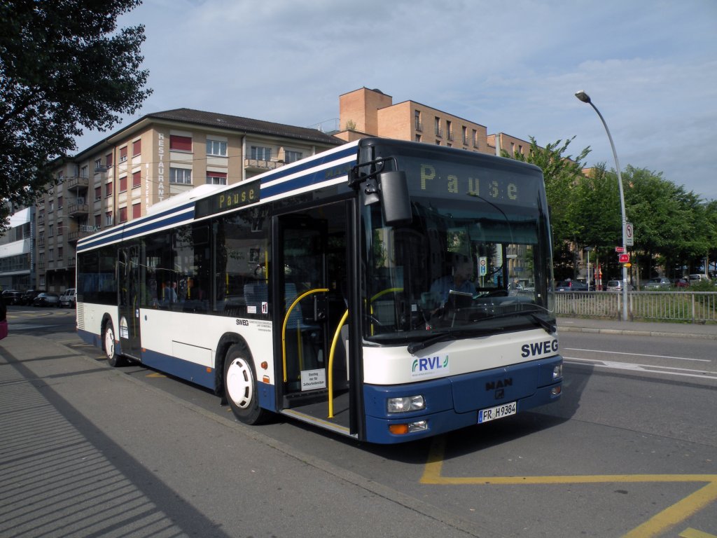 MAN Bus der SWEG FR H 9384 auf dem Pausenplatz in Kleinhningen bei Basel. Die Aufnahme stammt vom 20.05.2011.