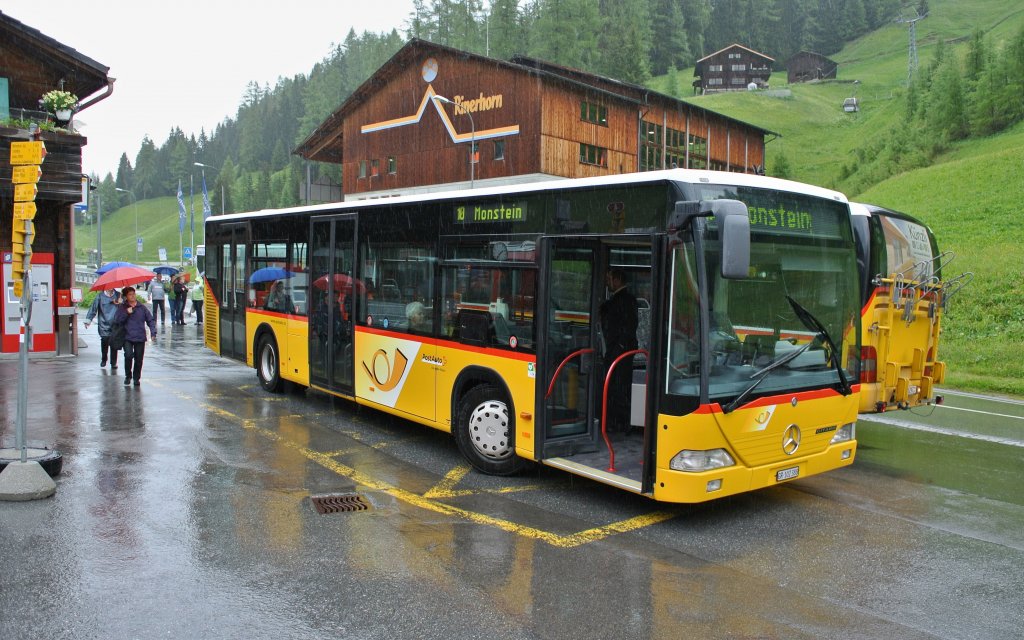 MB Citaro von Postauto fhrt fr die VBD auf der Linie 10 von Glaris nach Monstein, 10.06.2013.