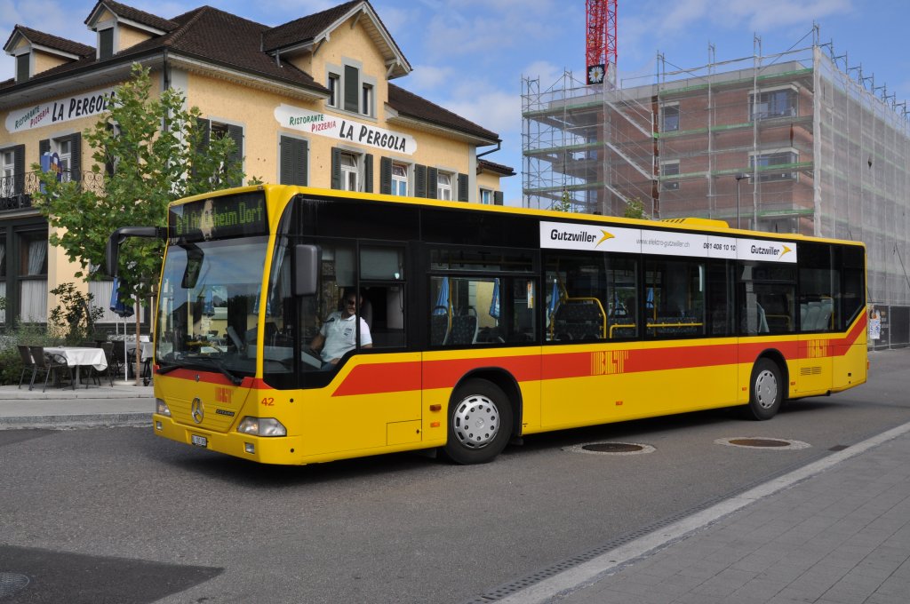 Mercedes Citaro mit der Betriebsnummer 42 auf der Linie 64 beim Bahnhof Dornach. Die Aufnahme stammt vom 16.08.2011.