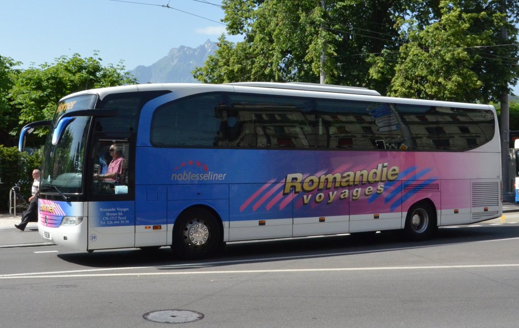 Mercedes Travego Reisebus in Luzern am 18.06.2013.