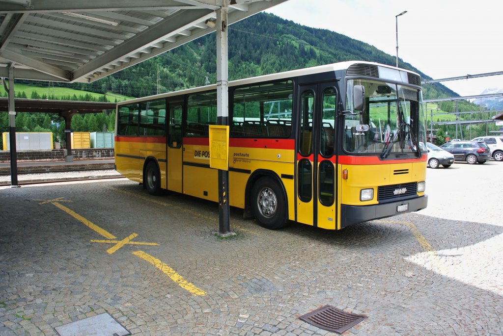 NAW Postauto als Reservewagen abgestellt beim Bahnhof Airolo, 25.06.2012.

