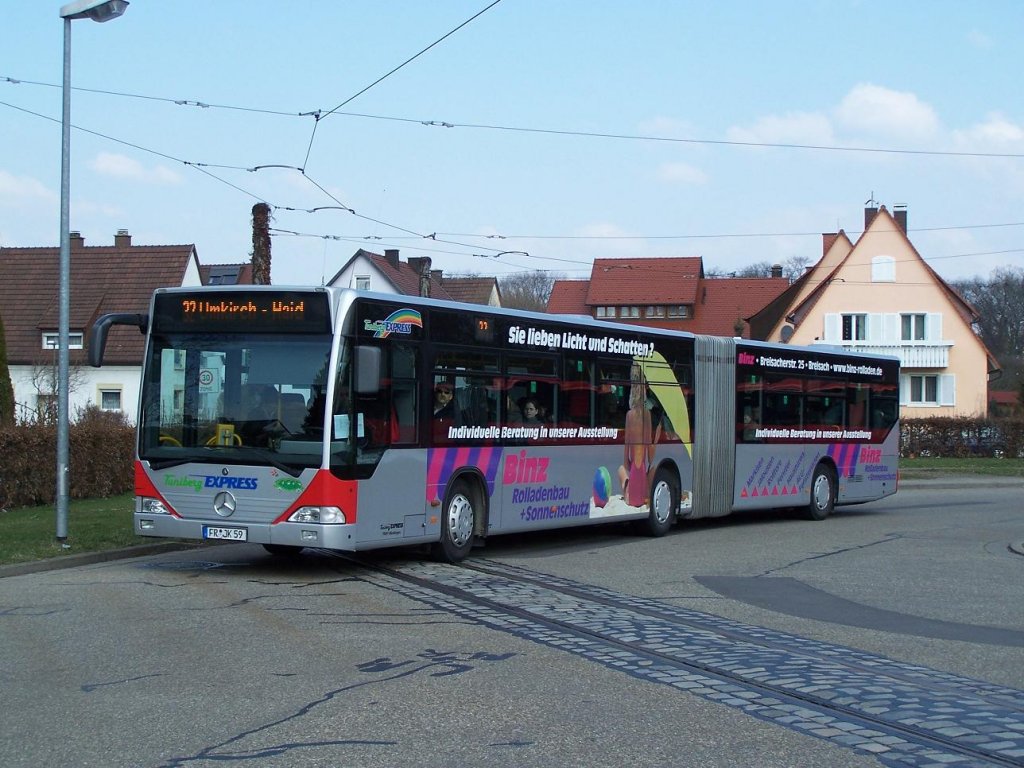 Paduaallee : Citaro Gelenkbus Nr 123 von Tuniberg Express am 09/03/10.
