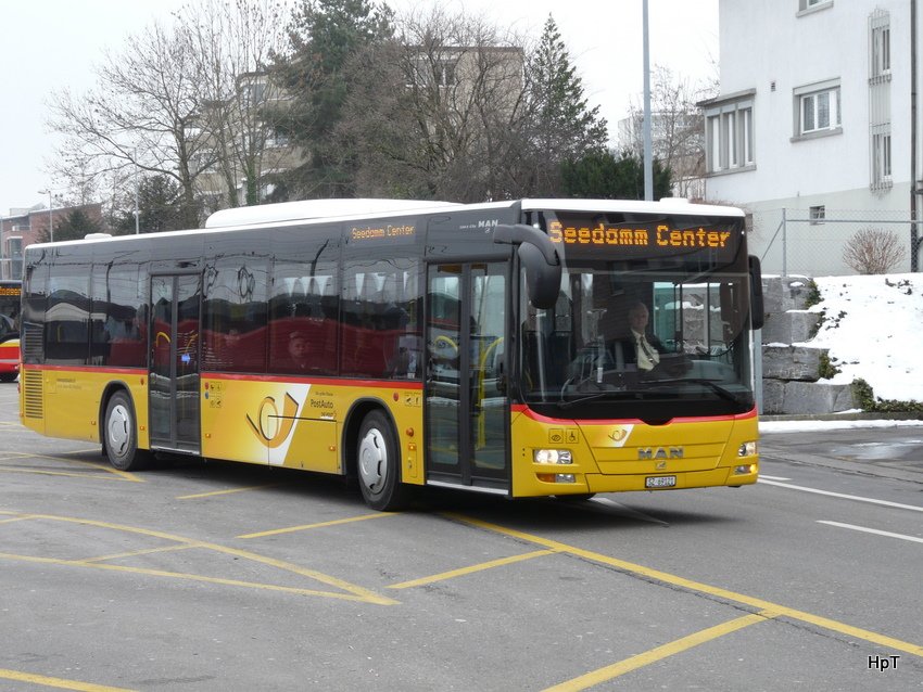 Postauto - MAN Lion`s City  SZ 69121 unterwegs zum Seedamm Center in Pfffikon/SZ am 16.01.2010