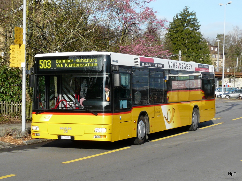 Postauto - MAN ZH 780681 beim Bahnhof in Bülach am 01.04.2011

