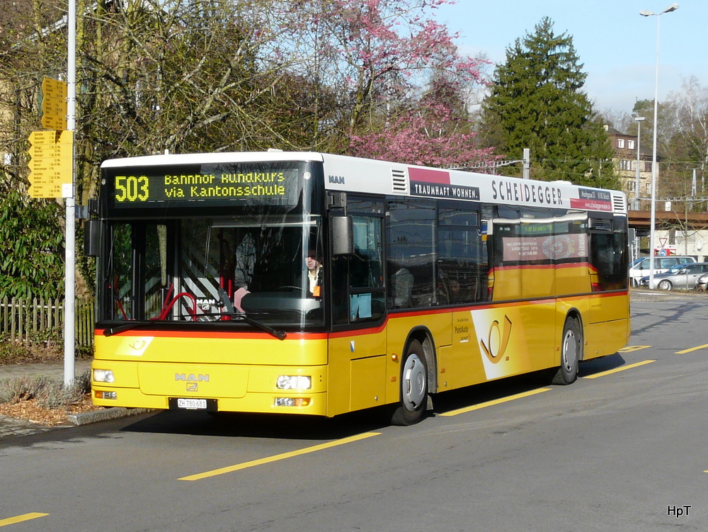 Postauto - MAN ZH 780681 beim Bahnhof in Blach am 01.04.2011

