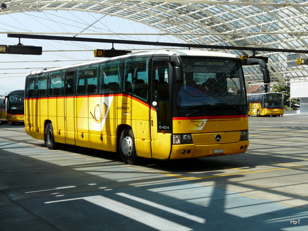Postauto - Mercedes O 404  TI 215197 im Busbahnhof von Chur am 22.04.2011