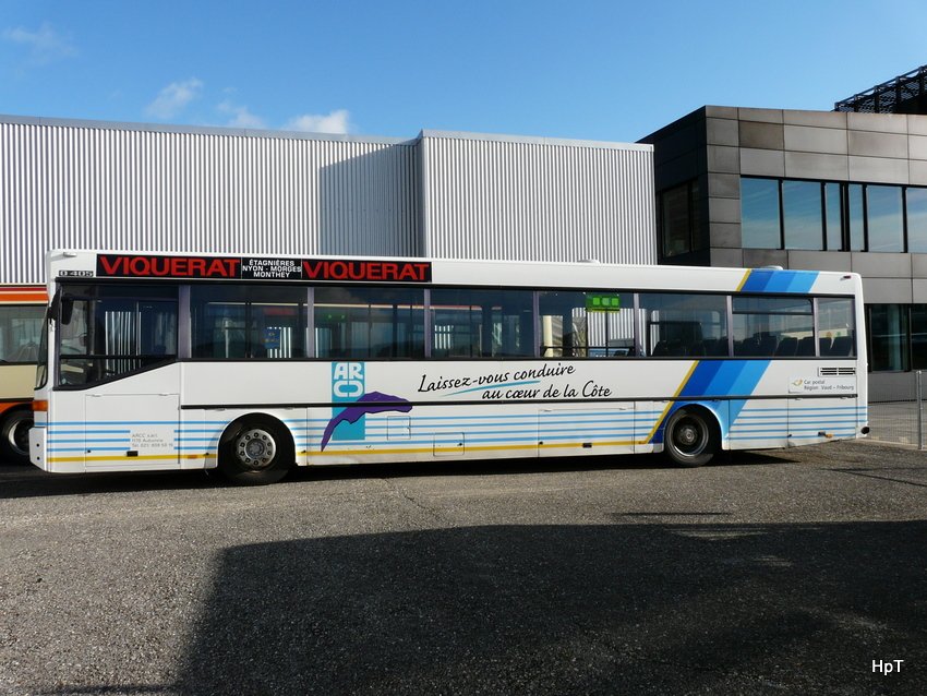 Postauto - Mercedes O 405 mit Werbung abgestellt mit bei Rattin Occasion Bushandel in Biel am