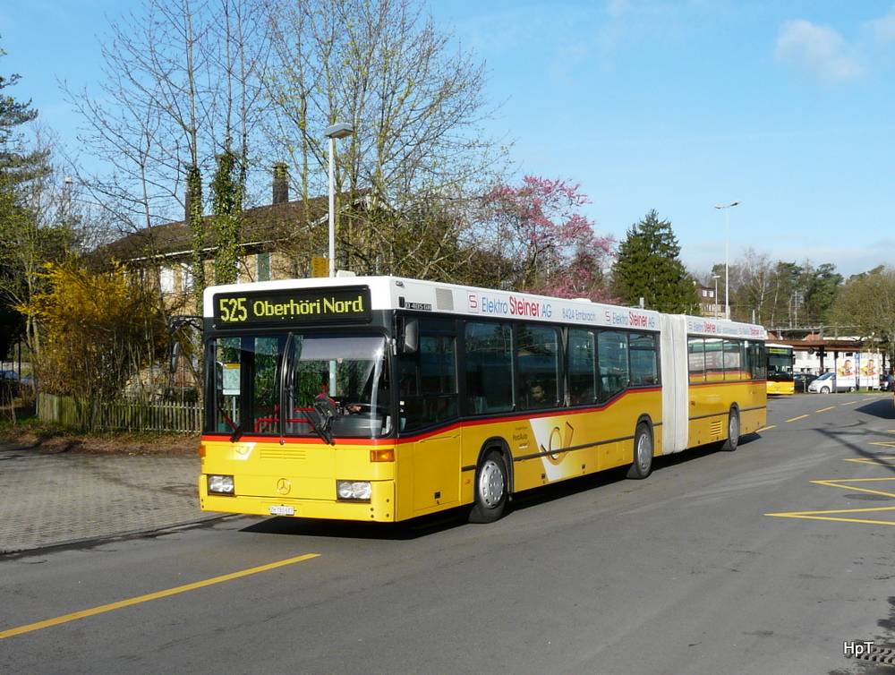 Postauto - Mercedes O 405 GN ZH 780687 beim Bahnhof in Blach am 01.04.2011
