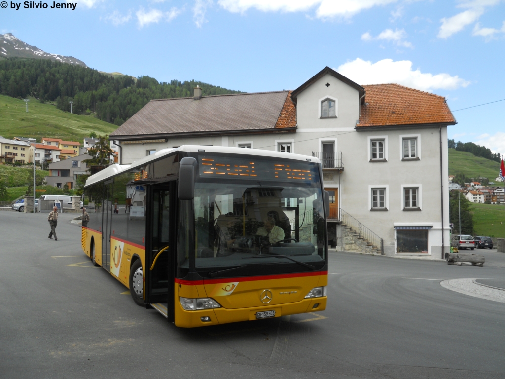 Postauto/Regie Scuol GR 159 303 (Mercedes CitaroII O530LE) am 7.6.2012 in Ftan, Cumn.