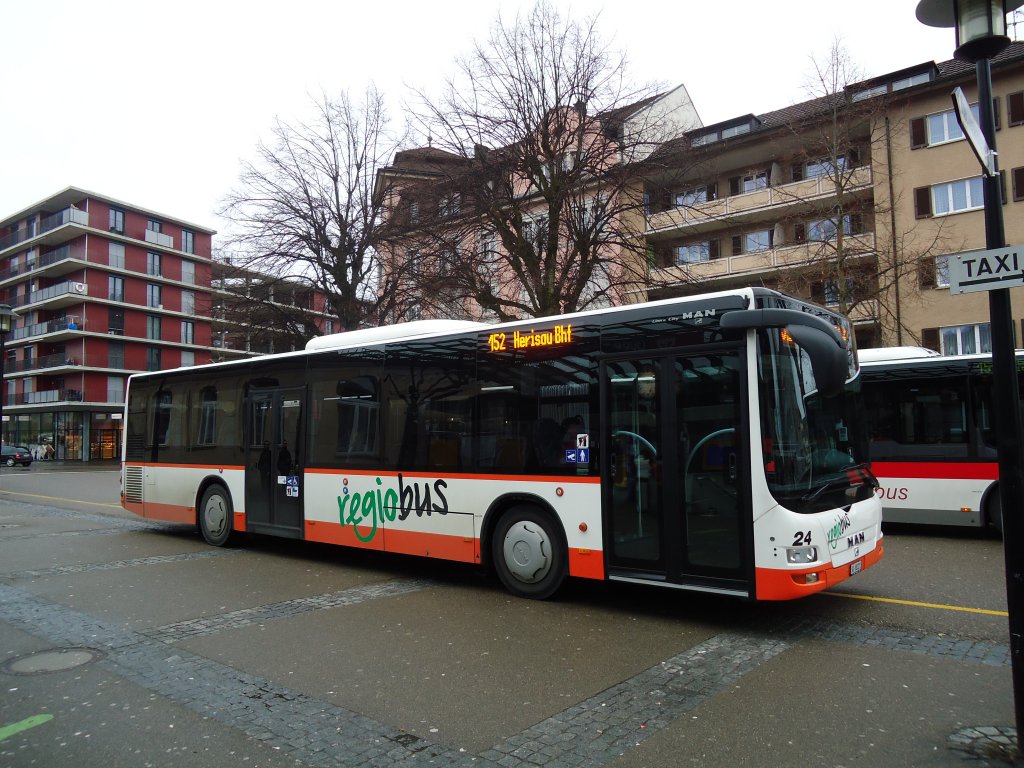 Regiobus, Gossau - Nr. 24/SG 88'221 - MAN am 12. Januar 2011 beim Bahnhof Gossau